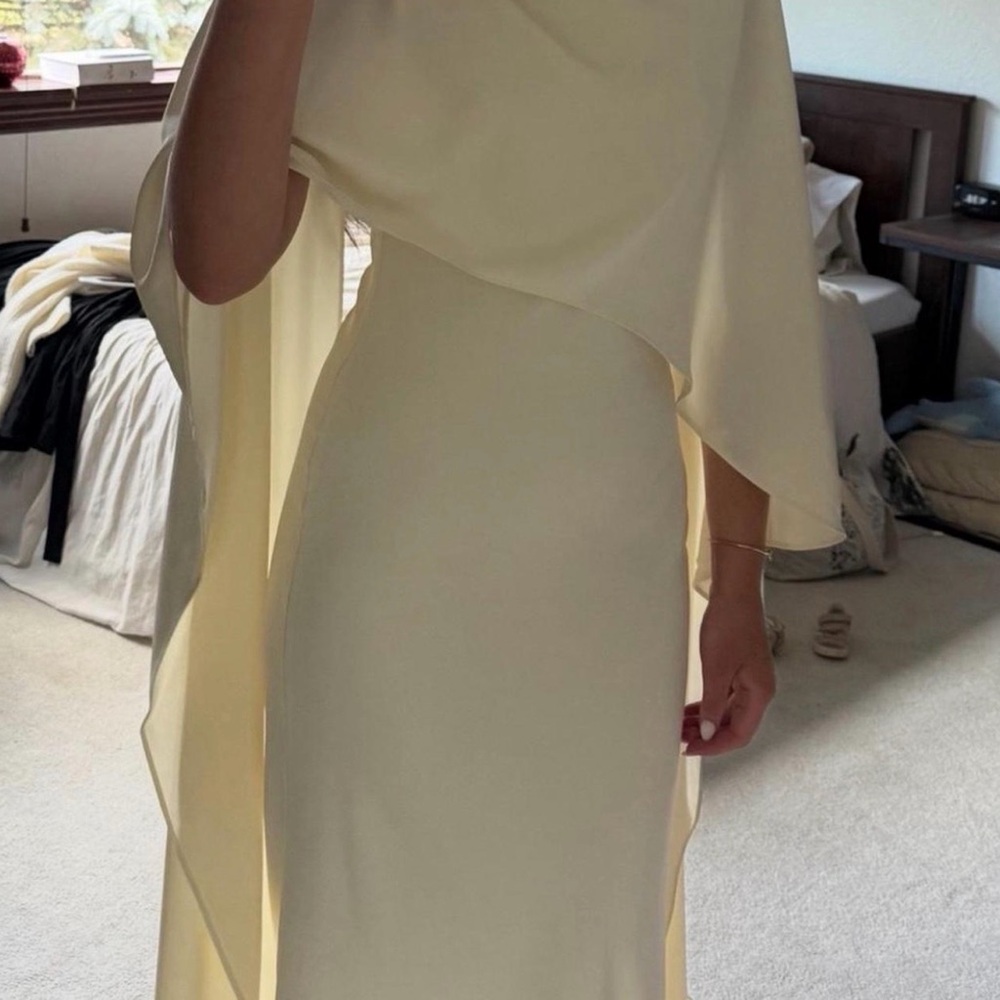 Ivory bridal gown with cape